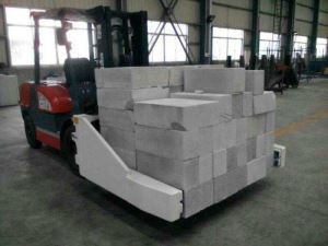 Затискач для бетонних блоків