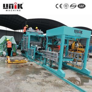 Машина для формування цементних блоків