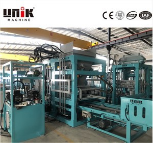 Машина для виготовлення порожнистих цементних блоків